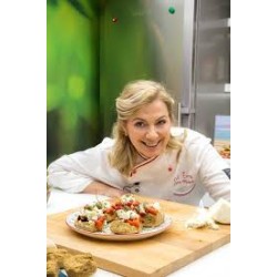 Recette du Dakos aux poivrons de Dina Nikolaou Recette du Dakos aux poivrons de Dina Nikolaou